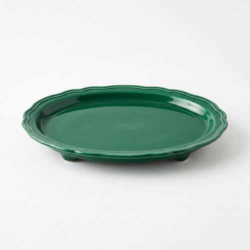 Emerald green scalloped jewelry tray white background