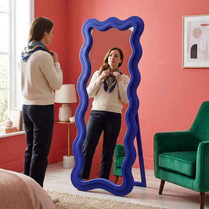 Wavy mirror used in colorful bedroom